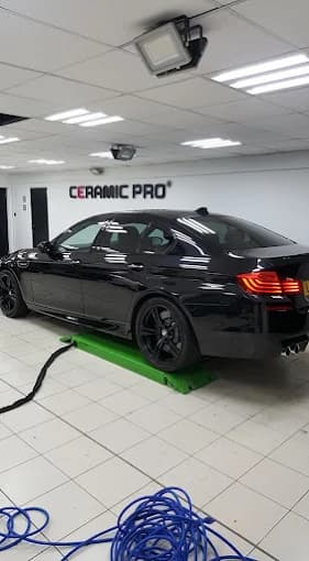 Black BMW M5 ceramic coating maintenance at Ceramic Pro North West, Bolton